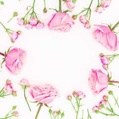 Floral frame composition with roses flowers and buds on white background. Flat lay, top view. Frame background