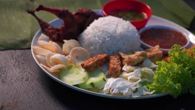 nasi lemak kukus with  quail meat ,malaysian local food