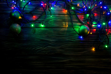 Christmas garland on wooden background