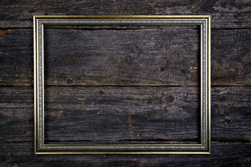 Old picture frame.Vintage wood background 