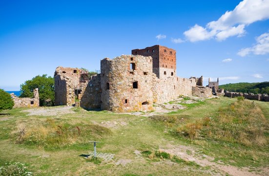 Hammershus castle - the biggest Northern Europe castle ruins situated at steep granite cliff on the Baltic Sea coast, Bornholm, Denmark