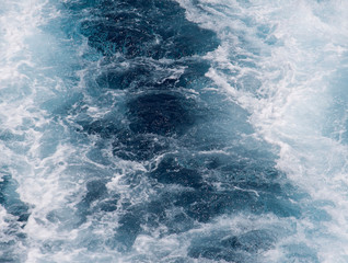 Fototapeta na wymiar Swirling sea water boat engine texture background.