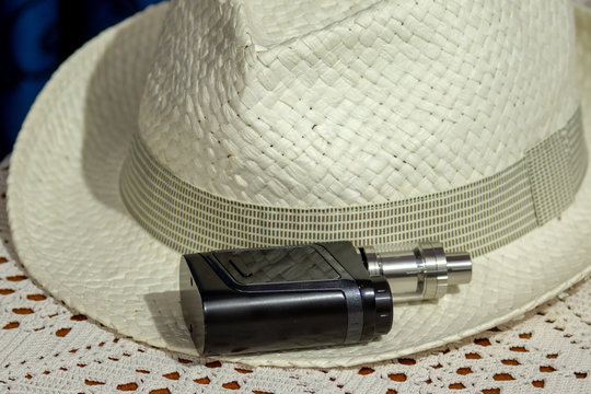 Electronic cigarette, electronic pipe, personal vaporizer, vaping device. e-pipe with blurred background
