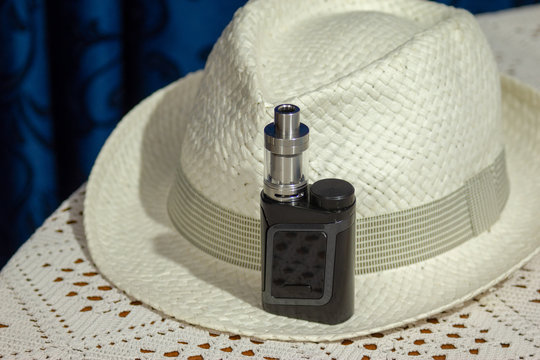 Electronic cigarette, electronic pipe, personal vaporizer, vaping device. e-pipe with blurred background