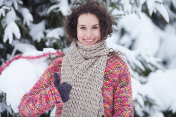 Winter woman Blowing Snow. Woman play with snow in winter park