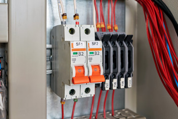 In the electrical Cabinet circuit breakers and fuse holders. Intermediate relay, cable channel for wiring. Modern electrical equipment for the safe distribution of electricity. Technology, production.