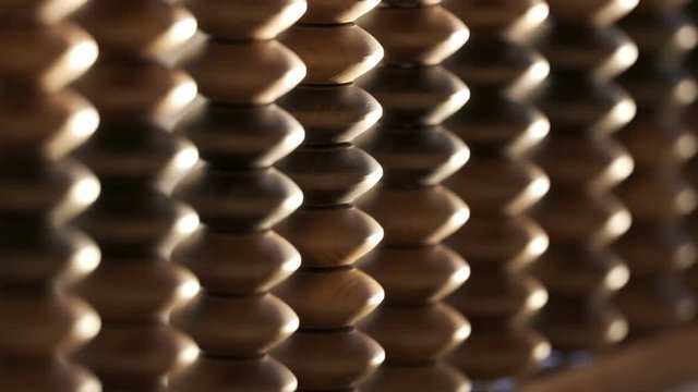 Vintage wooden abacus with beads and metal wire seamless looping animation.