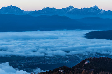 Wonderful Mountain Sunrise Landscape Panorama View From Gerlitzen To Villach In Carinthia Austria