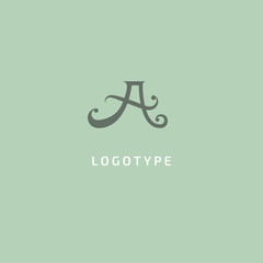 Monogram design elements, graceful template. Calligraphic elegant logo design. A logo line art monogram. Letter A on a dark background. Letter A vector logo. Business sign, identity, label, badge.