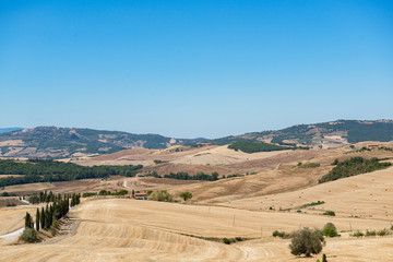 Fototapeta na wymiar Picturesque view on hills in summer, Tuscany, Italy. Scenic italian landscape.