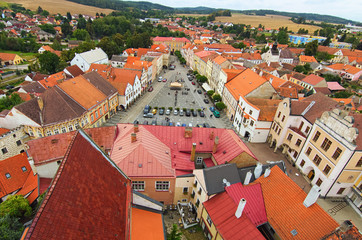 Fototapeta na wymiar Picturesque view of Peace Town Square from bell tower in Slavonice. Beautiful houses with vintage tile roofs. Slavonice, Czech Republic