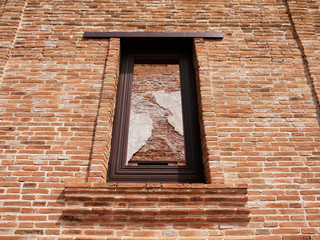 old vintage brick wall with window