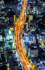 tokyo tower and city skyline under blue night