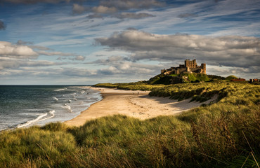 Late afternoon light on the castle and beach at Bamburgh
