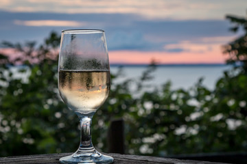 White Wine in a Chilled  Glass with Sunset view