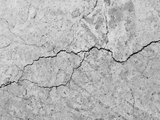 Cracked concrete texture closeup background