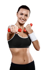 beautiful smiling sporty female with little dumbbells isolted