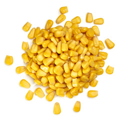 Boiled corn kernels pile / heap from top view isolated on white background.