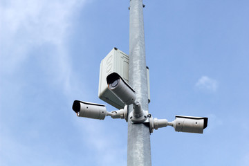 Modern CCTV cameras against bluesky