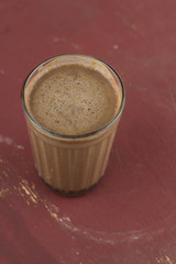 top view hot sweet homemade cocoa on a brown shabby wooden table