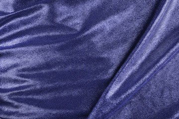 Crumpled fabric blue texture.