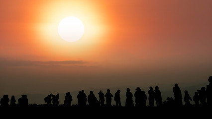 Fototapeta na wymiar Group of people silhouette in mountains