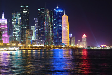 Fototapeta premium Financial centre in Doha city at night, Qatar