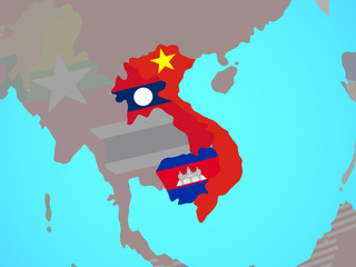 Indochina with national flags on blue political globe.