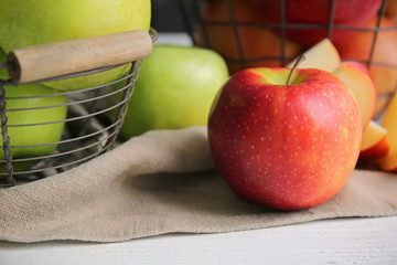 Sweet tasty apple on wooden table