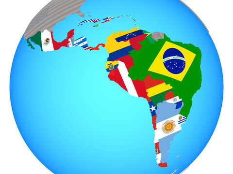 Latin America with national flags on blue political globe.