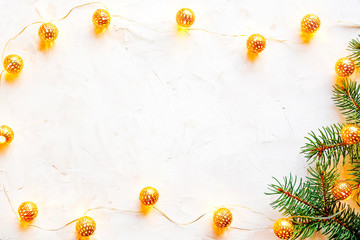 Christmas mood concept. Layout composition with traditional festive attributes, green decorative fresh pine tree branches. Winter holidays season. Background, copy space, close up, top view, flat lay.