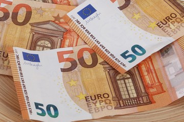 close up from different fifty euros in the studio