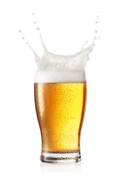 Splash in glass of beer