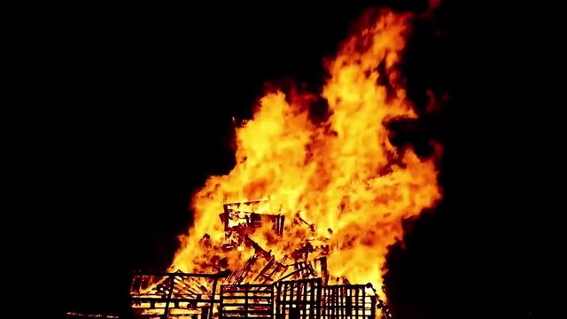Fire with large flames at dark night environment