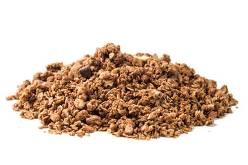 Crunchy granola, muesli pile with chocolate isolated on white background