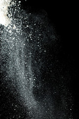 white flour on a black background