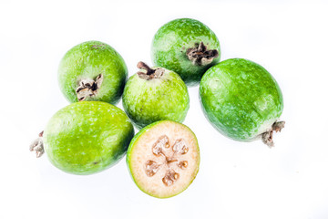 Tropical fruit, raw organic feijoa isolated on white background layout pattern copy space top view