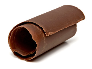 Dark chocolate curl isolated on white background