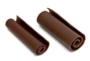 Dark chocolate curls isolated on white background