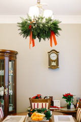 Beautiful served christmas table with decorations, candles, christmas flower.