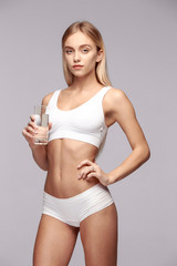 Fototapeta premium Perfect slim toned young body of the girl .