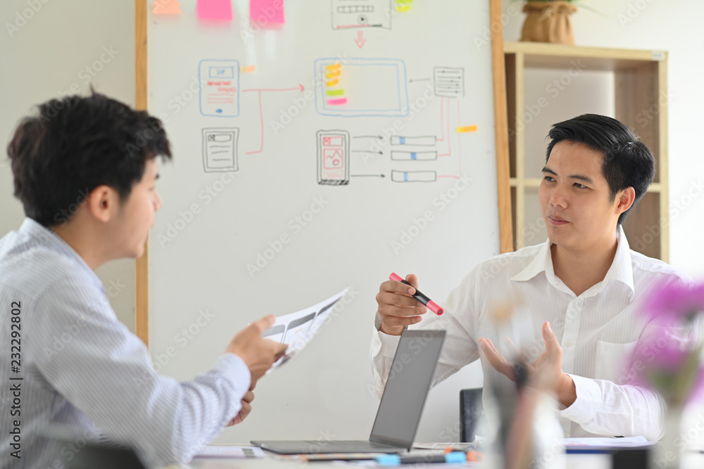 Wall mural web designer teamwork concept ux ui designer planning layout application for mobile phone mockup