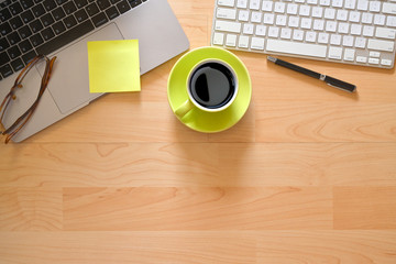 Top view office table with office accessories and copy space.