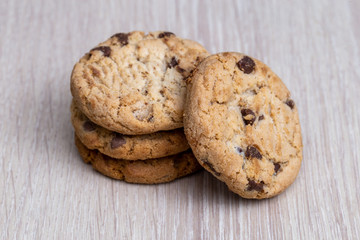 Wholemeal biscuits made emc, on wooden table. Homemade cookie, very tasty.