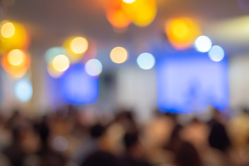 Blurred the participants in the meeting conference and event on stage