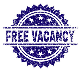 FREE VACANCY stamp seal watermark with distress style. Blue vector rubber print of FREE VACANCY tag with retro texture.