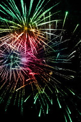 Brightly Colorful Fireworks on black background