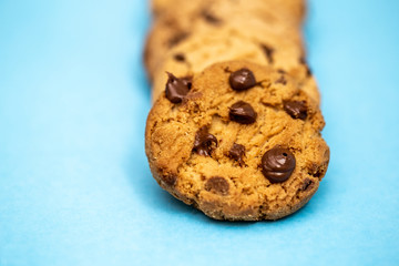 Creamy chocolate filling cookies. Drops of creamy chocolate on homemade biscuit.