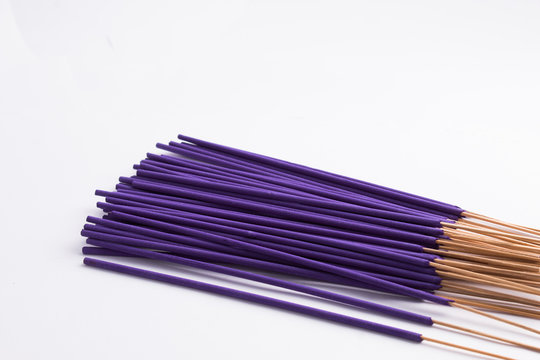 Purple Incence sticks isolated on white background