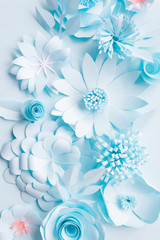 blue paper flowers on the blue background